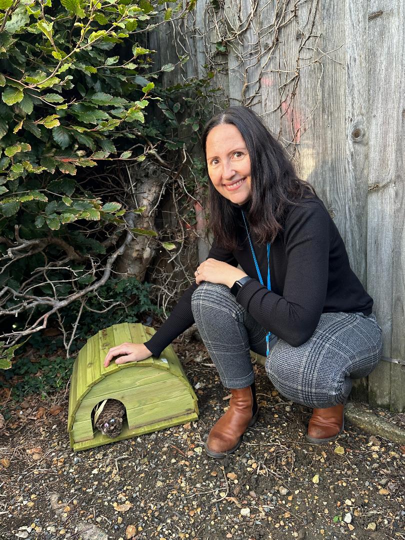 Emma Danielsson with a hedgehog house